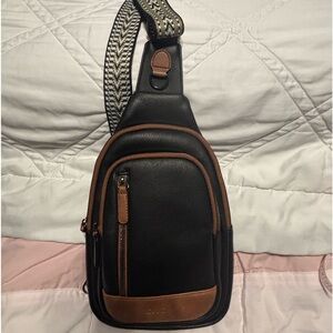 PU leather sling bag.